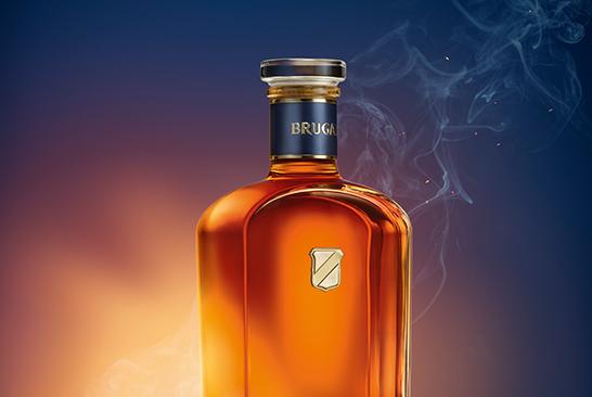 Maestro Reserva rum bottle on dusk smoky background